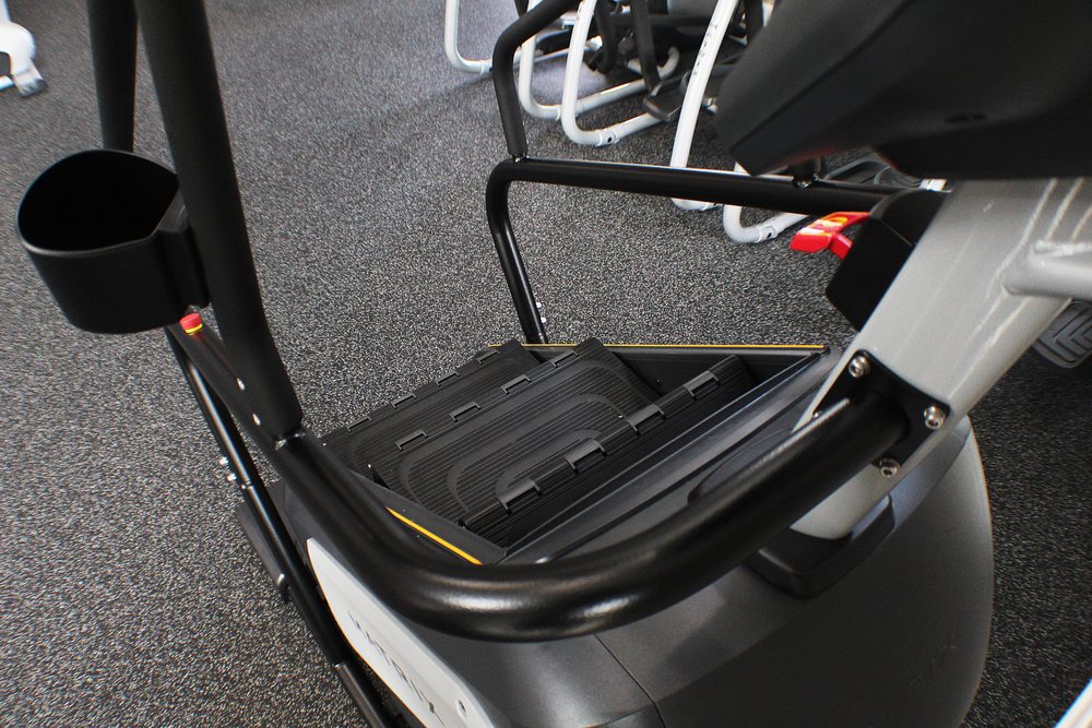 A black and gray Stairmaster machine in a gym.